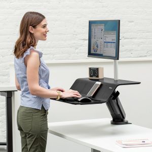 Lotus™ RT Sit-Stand Workstation (Single, Black) - lifestyle 'in use' view