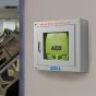 ZOLL AED Plus Fully Automatic Defibrillator - lifestyle shot, shown within the Indoor Standard Wall Cabinet