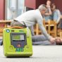 ZOLL AED 3 Fully Automatic Defibrillator - lifestyle shot, depicting a situation where the AED is needed