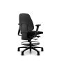 RH Activ 222 Ergonomic Office & Industry Chair - black, back angle view, with armrests, footring and glides